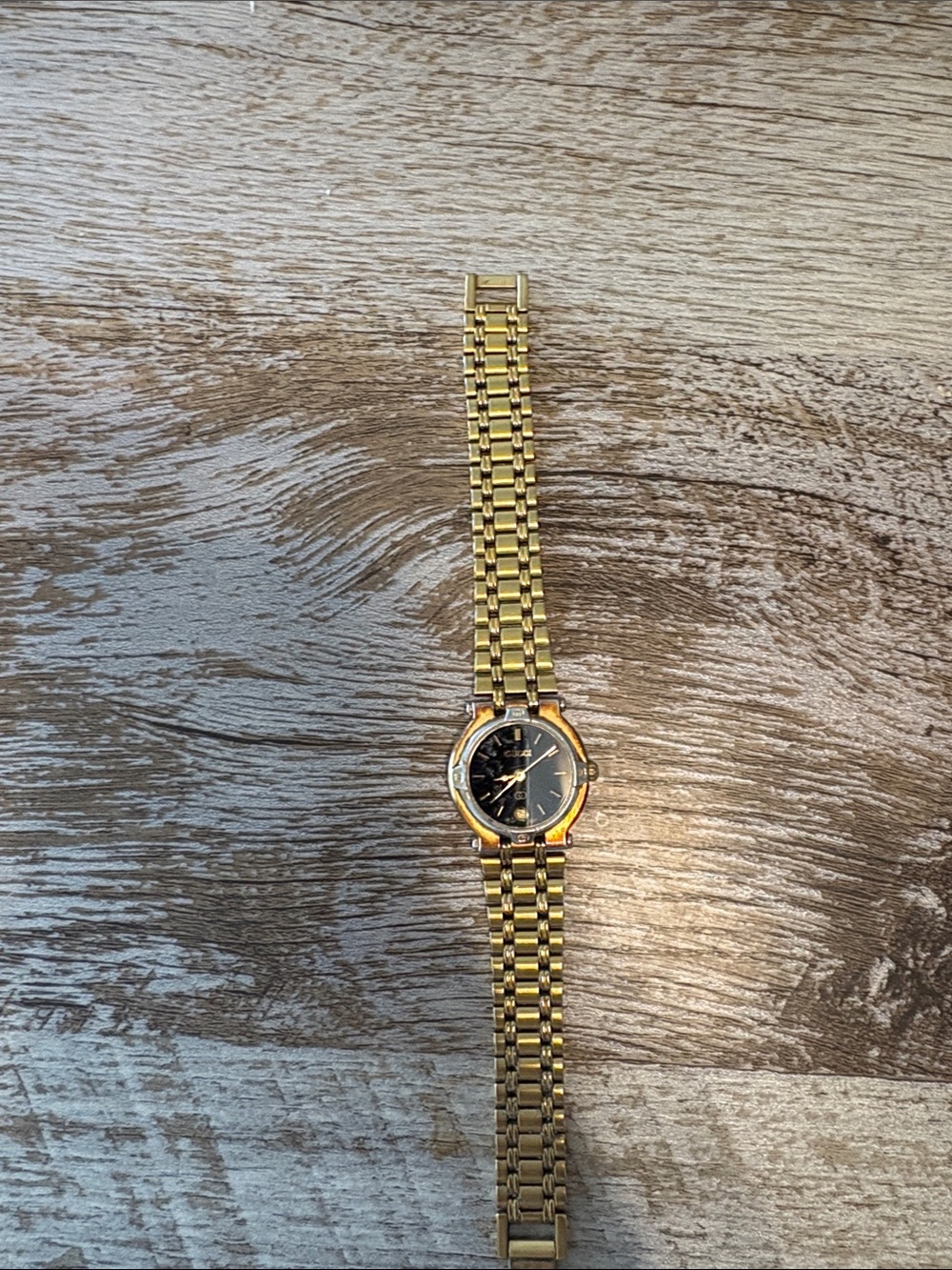 Gucci Gold Tone Bracelet Watch with Black Dial